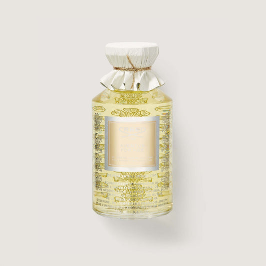 Frasco de perfume Creed Aventus for her con tapón dorado