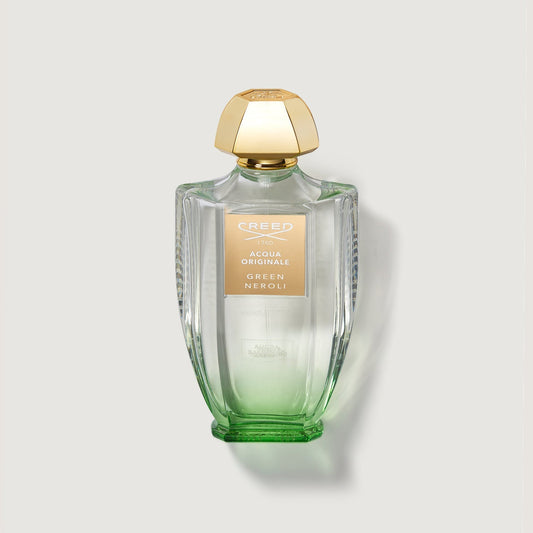 Frasco de Creed Green Neroli de 100 ml sobre fondo blanco